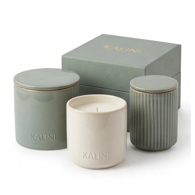 Sage and ivory round ceramic jars with a fluted jar