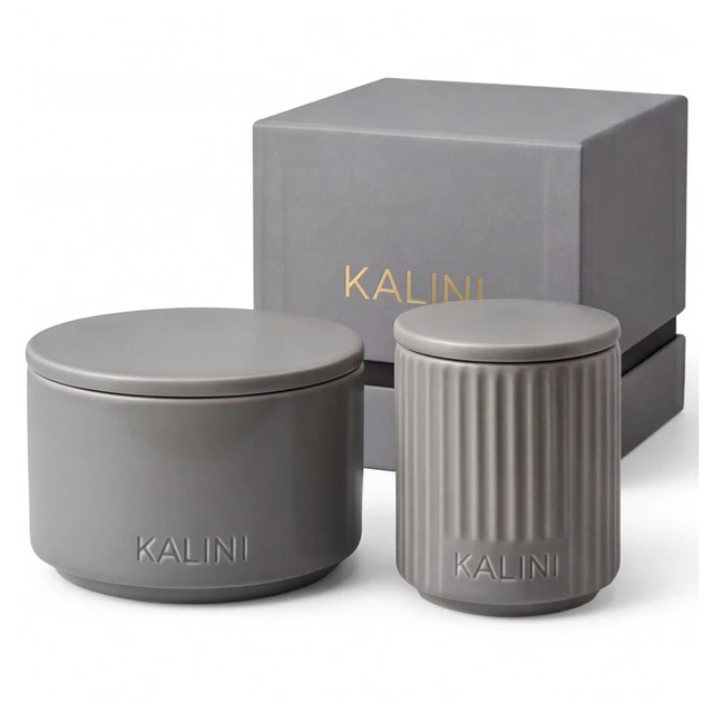 Gray round and fluted ceramic candle jars with a gray box