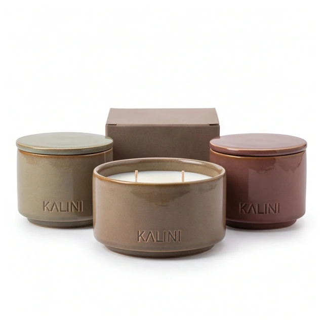 Brown ceramic candle bowl with taupe and rose-toned jars