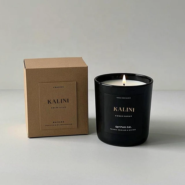 Black round glass candle jar and an upright kraft-colored box