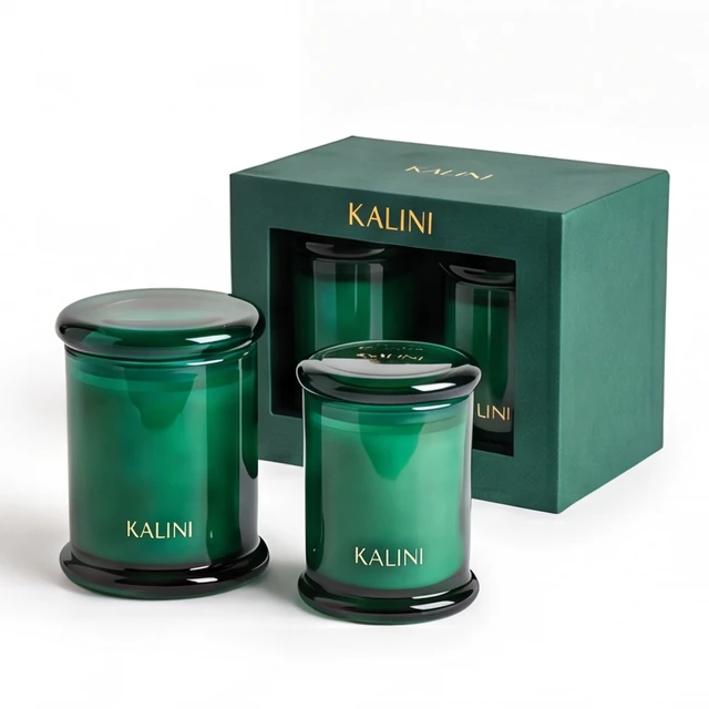 Green spool-shaped glass candle jar presentation