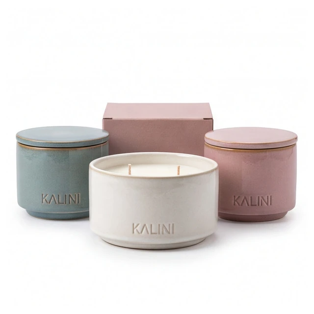 Ivory ceramic candle bowl with blue and pink jars